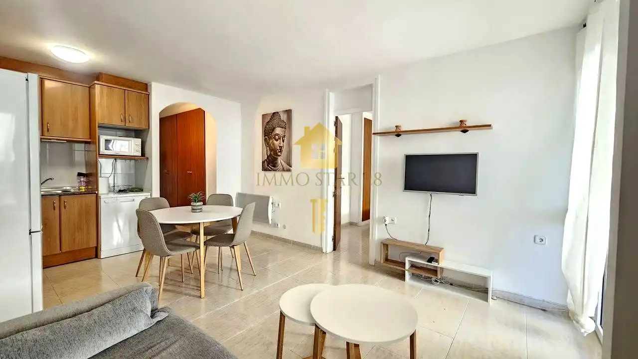 Sala d'estar de Planta baixa en venda en Roses amb Aire condicionat, Terrassa i Moblat