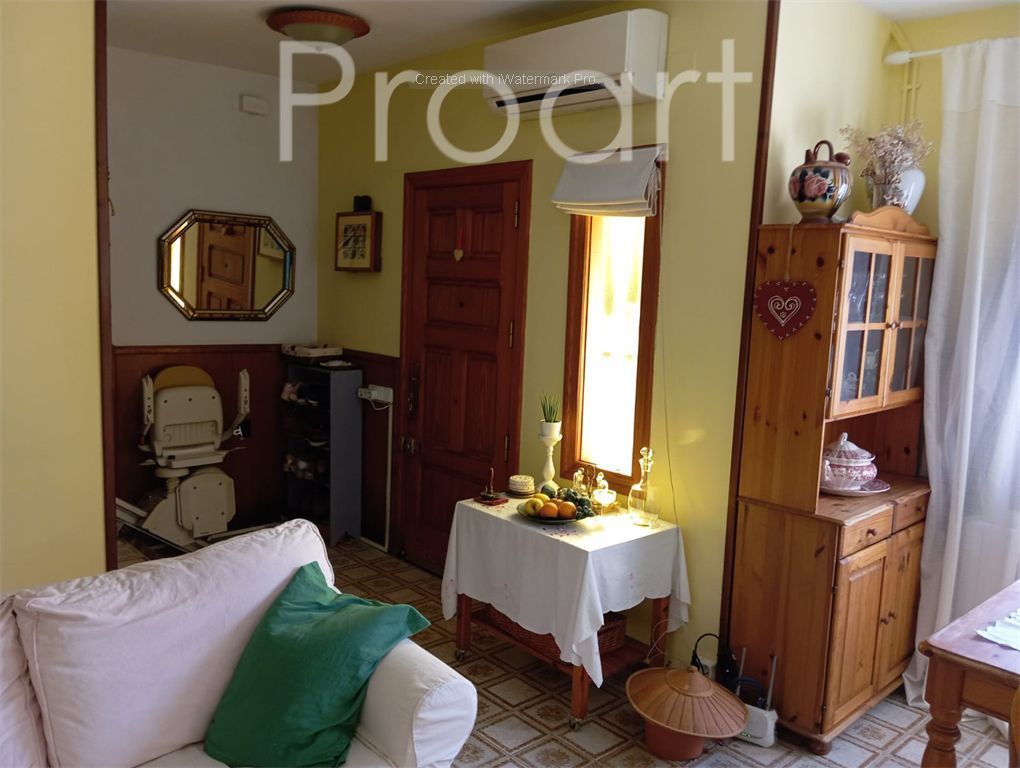 Sala d'estar de Casa adosada en venda en Riells i Viabrea amb Calefacció, Jardí privat i Terrassa