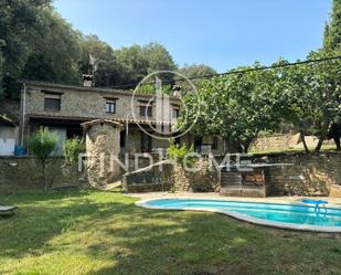 Außenansicht von Country house zum verkauf in Sant Miquel de Campmajor mit Terrasse und Schwimmbad