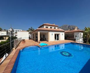 Vista exterior de Casa o xalet en venda en Beniarbeig amb Aire condicionat, Terrassa i Piscina