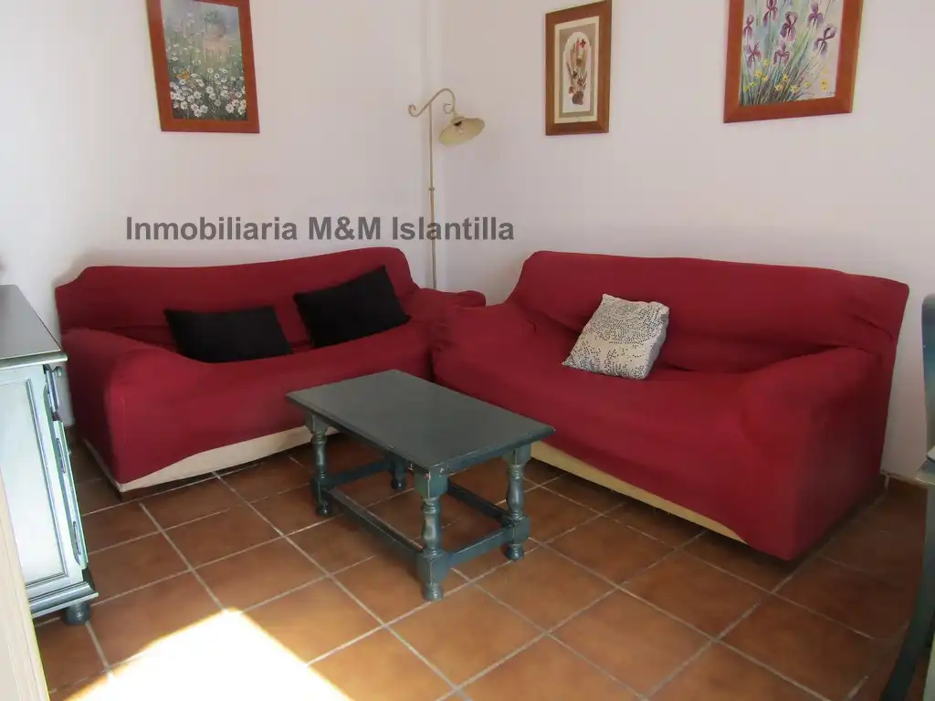 Sala de estar de Casa adosada en venta en Islantilla con Terraza, Trastero y Amueblado