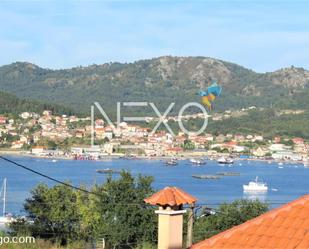 Vista exterior de Casa o xalet en venda en Cangas  amb Terrassa i Balcó