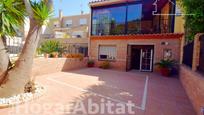 Vista exterior de Casa adosada en venda en Canet d'En Berenguer amb Calefacció, Jardí privat i Terrassa