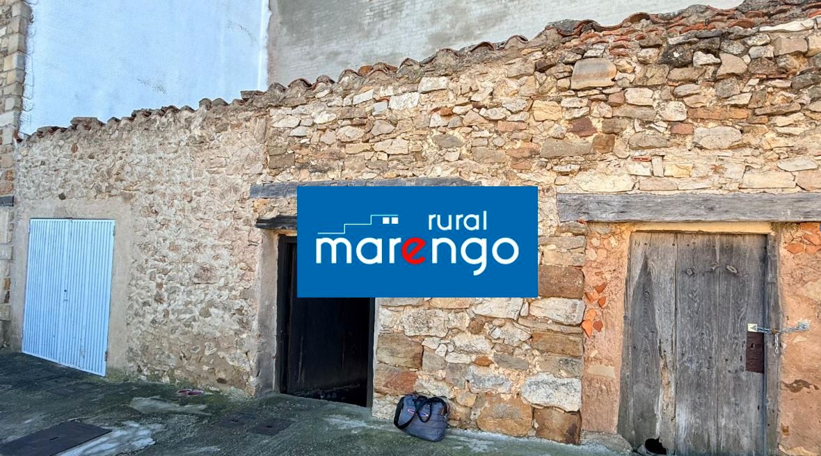 Vista exterior de Casa adosada en venda en Puertomingalvo amb Traster