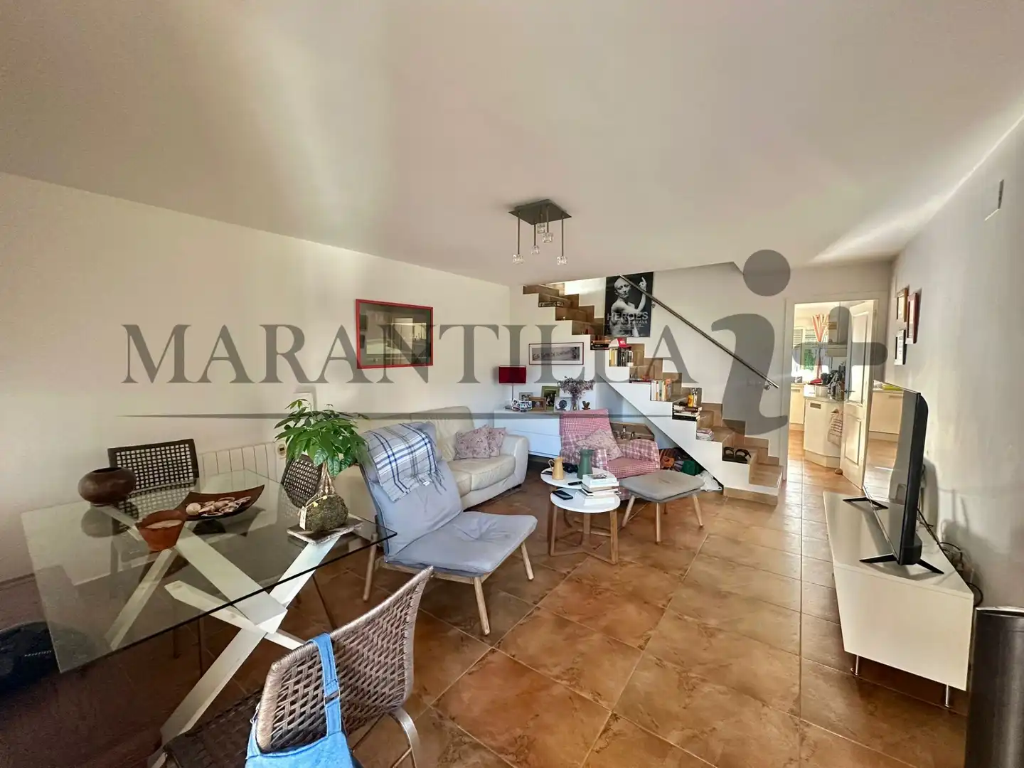 Sala d'estar de Casa adosada en venda en La Antilla amb Aire condicionat, Terrassa i Traster