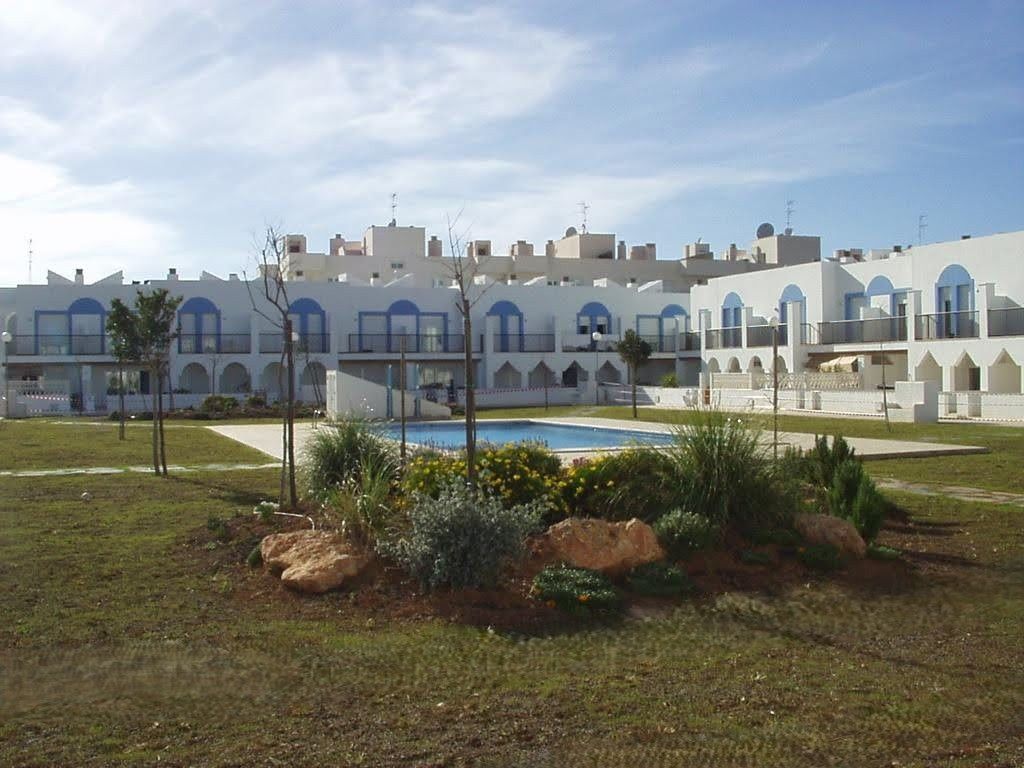 Exterior view of Single-family semi-detached for sale in Sant Josep de sa Talaia  with Air Conditioner, Parquet flooring and Terrace