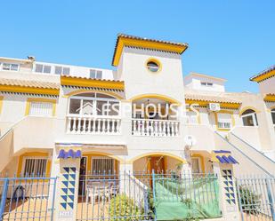 Exterior view of Single-family semi-detached for sale in Guardamar del Segura  with Air Conditioner and Balcony