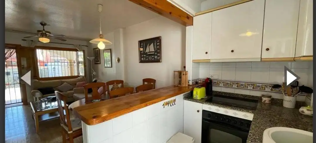 Cocina de Casa adosada en venta en Pilar de la Horadada con Aire acondicionado, Calefacción y Jardín privado