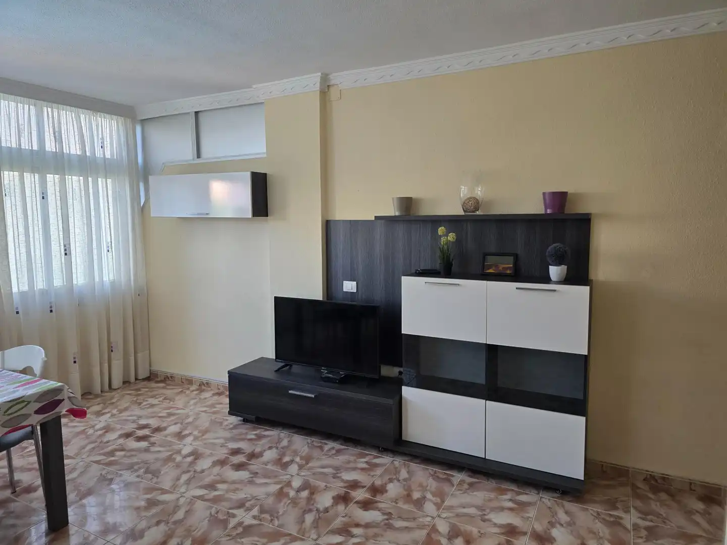 Sala d'estar de Apartament de lloguer en San Bartolomé de Tirajana amb Moblat i Piscina comunitària