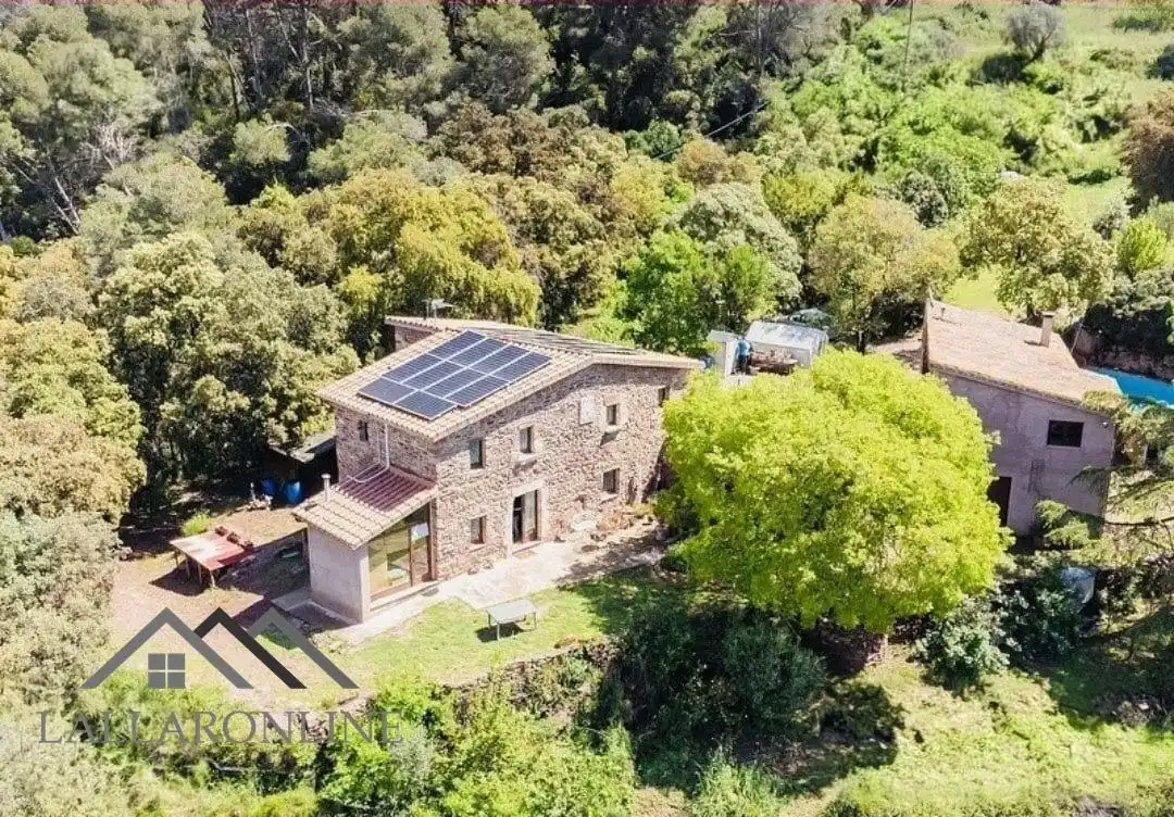 Casa rústica amb piscina en venda a Bigues i Riells del Fai