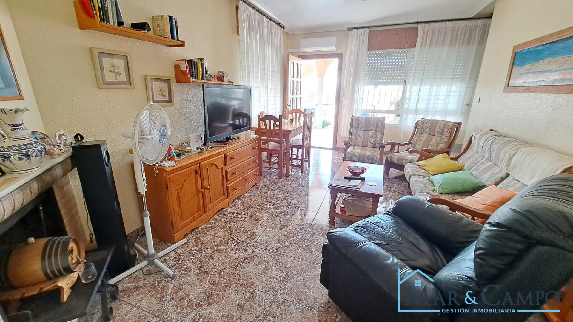 Sala de estar de Casa adosada en venta en Los Alcázares con Aire acondicionado, Jardín privado y Amueblado