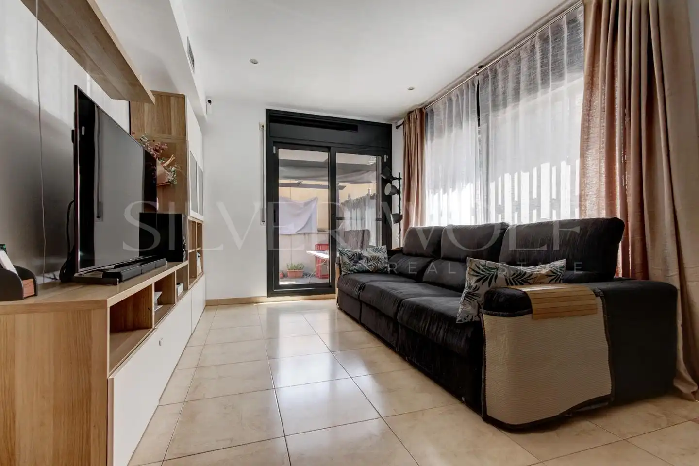 Sala d'estar de Planta baixa en venda en Castelldefels amb Aire condicionat, Terrassa i Traster