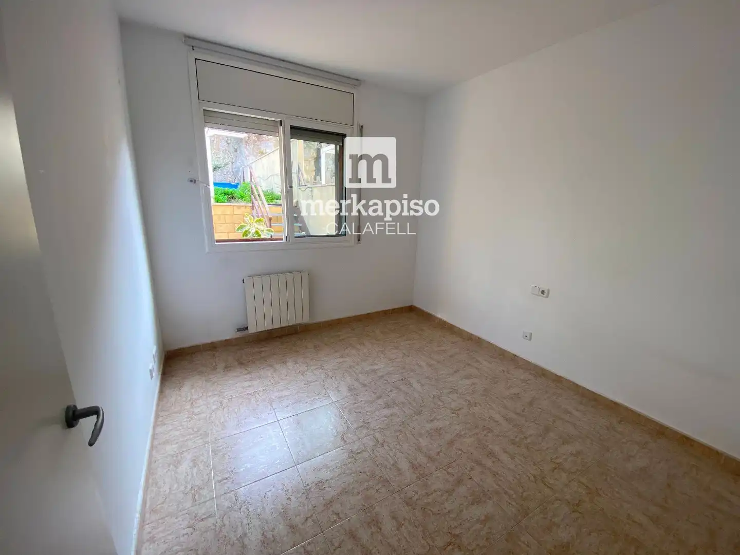 Schlafzimmer von Einfamilien-Reihenhaus zum Verkauf in Calafell mit Heizung
