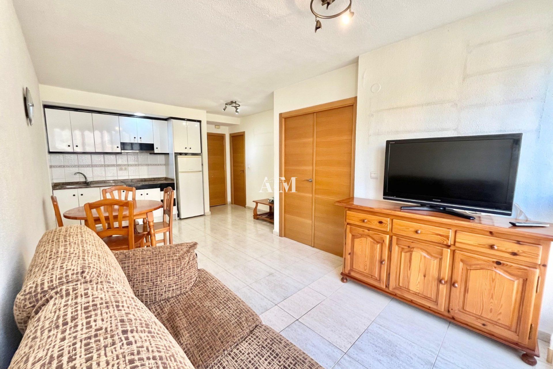 Wohnzimmer von Wohnung miete in Guardamar del Segura mit Möbliert und Fernseher