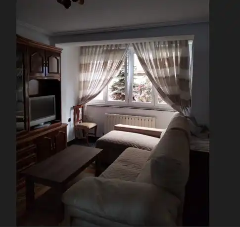 Sala de estar de Piso en venta en Gijón  con Calefacción, Jardín privado y Amueblado