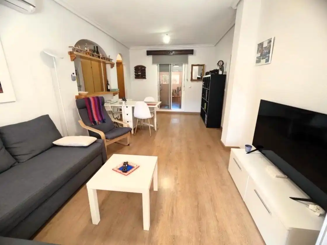 Sala d'estar de Casa adosada de lloguer en Santa Pola amb Aire condicionat, Calefacció i Parquet