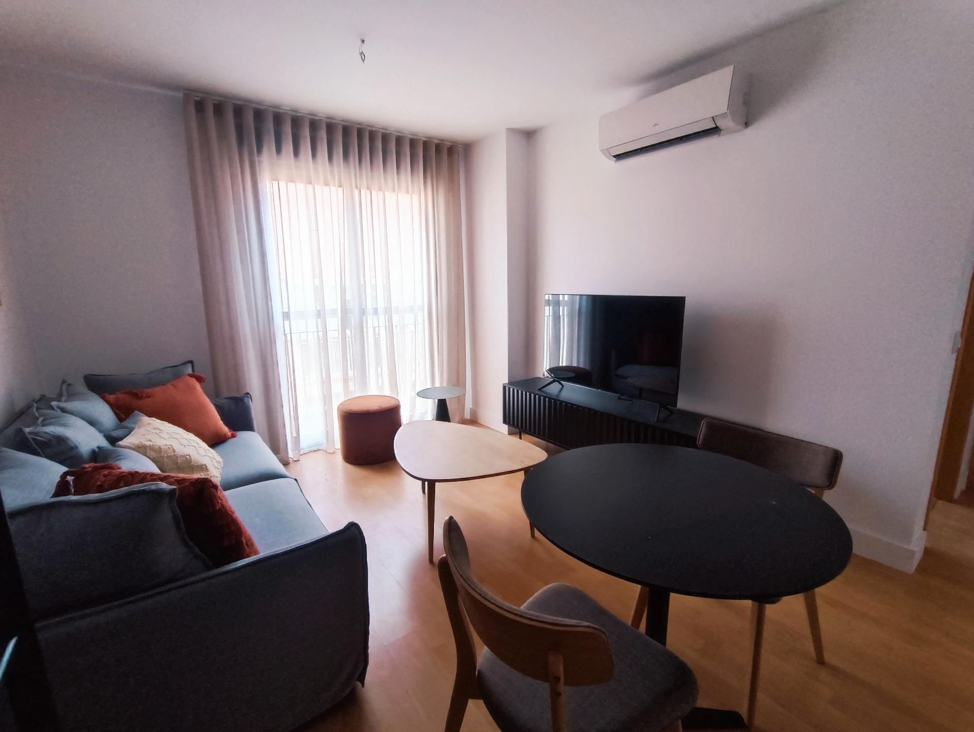 Sala d'estar de Apartament de lloguer en Málaga Capital amb Aire condicionat, Moblat i Rentadora