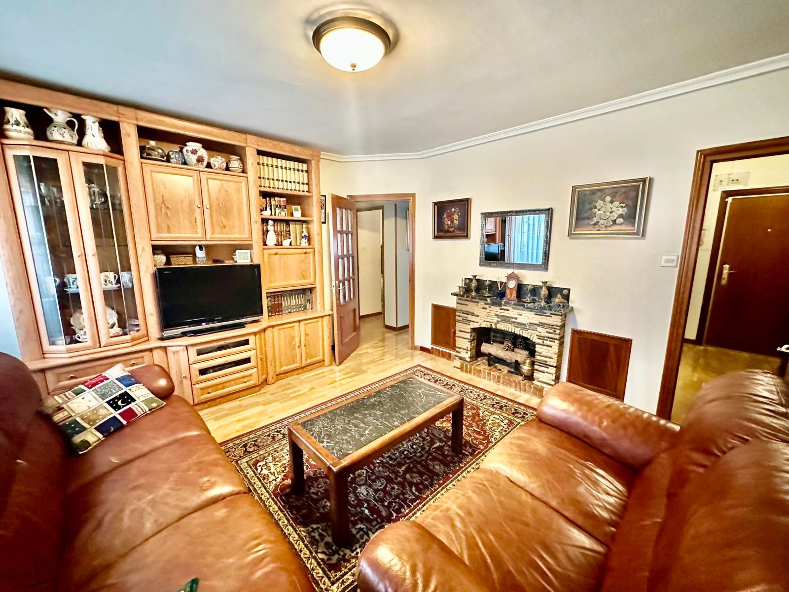 Sala de estar de Piso en venta en  Madrid Capital con Calefacción, Trastero y Amueblado