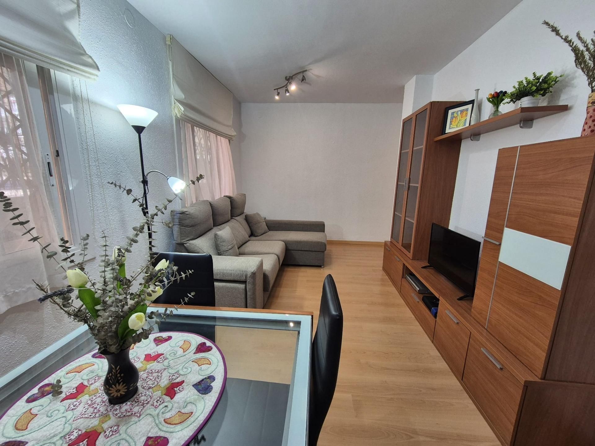Living room of Apartment for sale in Calella  with Private garden, Parquet flooring and Balcony