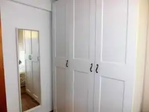 Schlafzimmer von Wohnung zur Miete in Gijón  mit Parkett, Möbliert und Waschmaschine