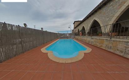 Swimming pool of Single-family semi-detached for sale in Roda de Berà  with Air Conditioner, Terrace and Swimming Pool