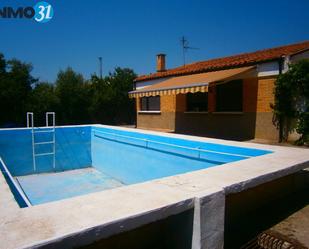 Piscina de Casa adosada en venda en Mélida amb Terrassa