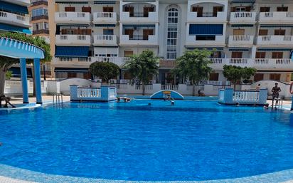 Swimming pool of Apartment for sale in Torrevieja  with Air Conditioner, Terrace and Furnished