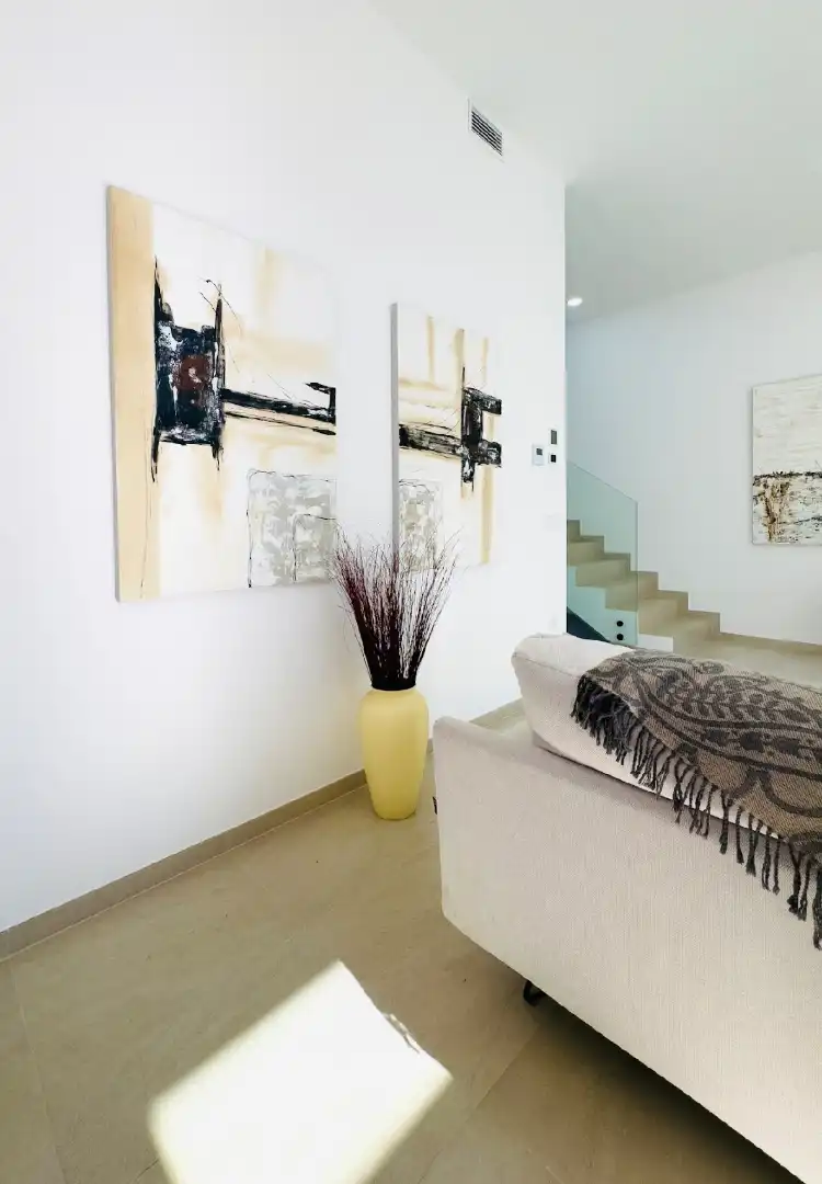 Sala d'estar de Casa adosada en venda en Calpe / Calp amb Aire condicionat, Calefacció i Jardí privat