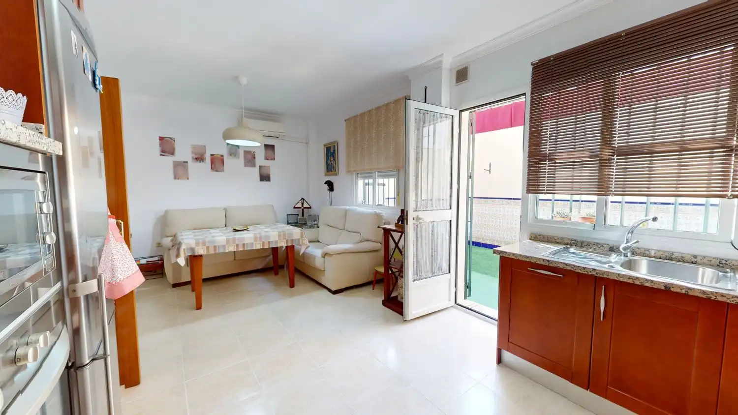 Sala d'estar de Casa o xalet en venda en Alcalá de Guadaira amb Aire condicionat i Terrassa