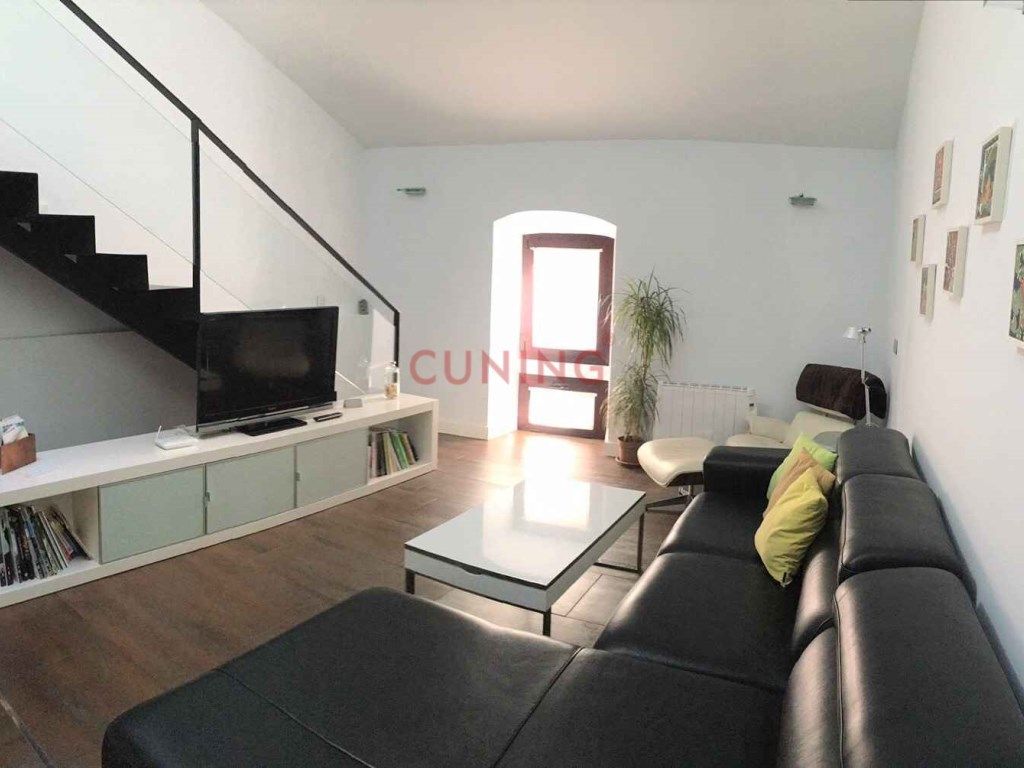 Sala d'estar de Casa adosada en venda en Cáceres Capital