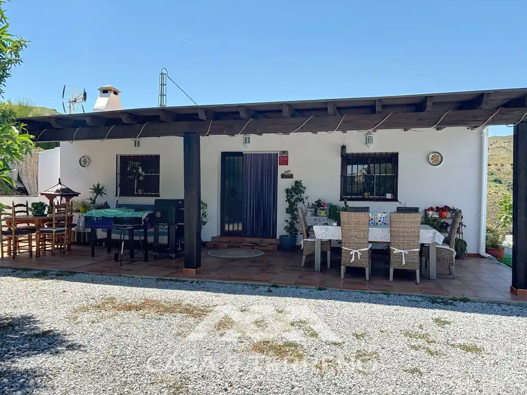 Garden of Country homes for sale in El Borge  with Air Conditioner and Swimming Pool