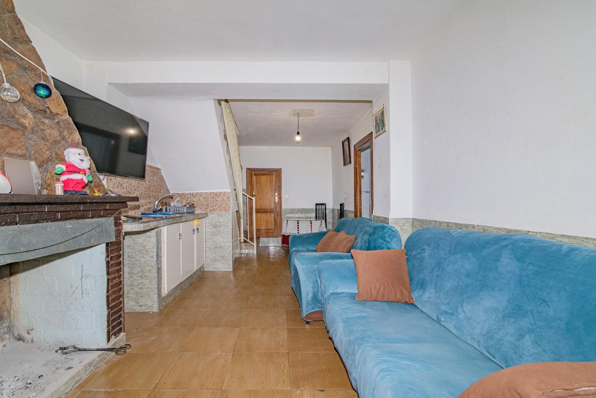 Sala d'estar de Casa adosada en venda en Deifontes amb Calefacció i Balcó