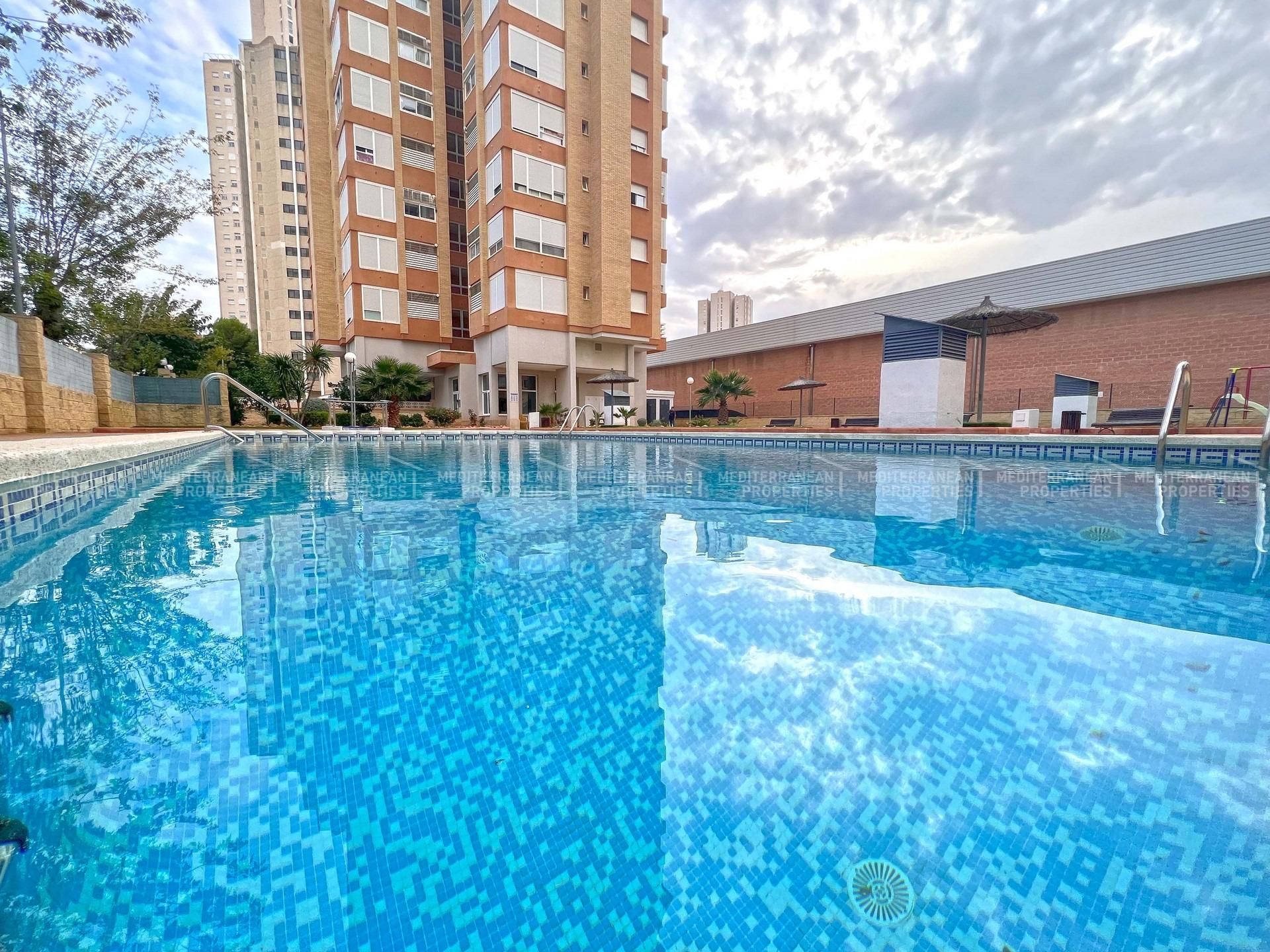 Swimming pool of Apartment for sale in Benidorm  with Air Conditioner, Private garden and Terrace