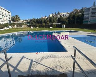 Swimming pool of Duplex for sale in Rincón de la Victoria  with Air Conditioner, Heating and Terrace