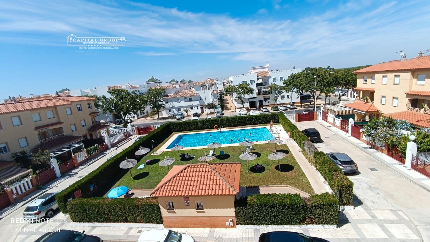 Piscina de Casa adosada en venda en Punta Umbría amb Aire condicionat, Jardí privat i Terrassa