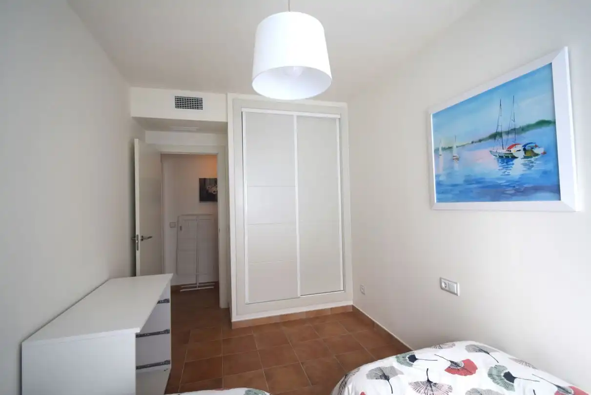 Dormitori de Apartament de lloguer en La Alcaidesa amb Aire condicionat, Calefacció i Jardí privat