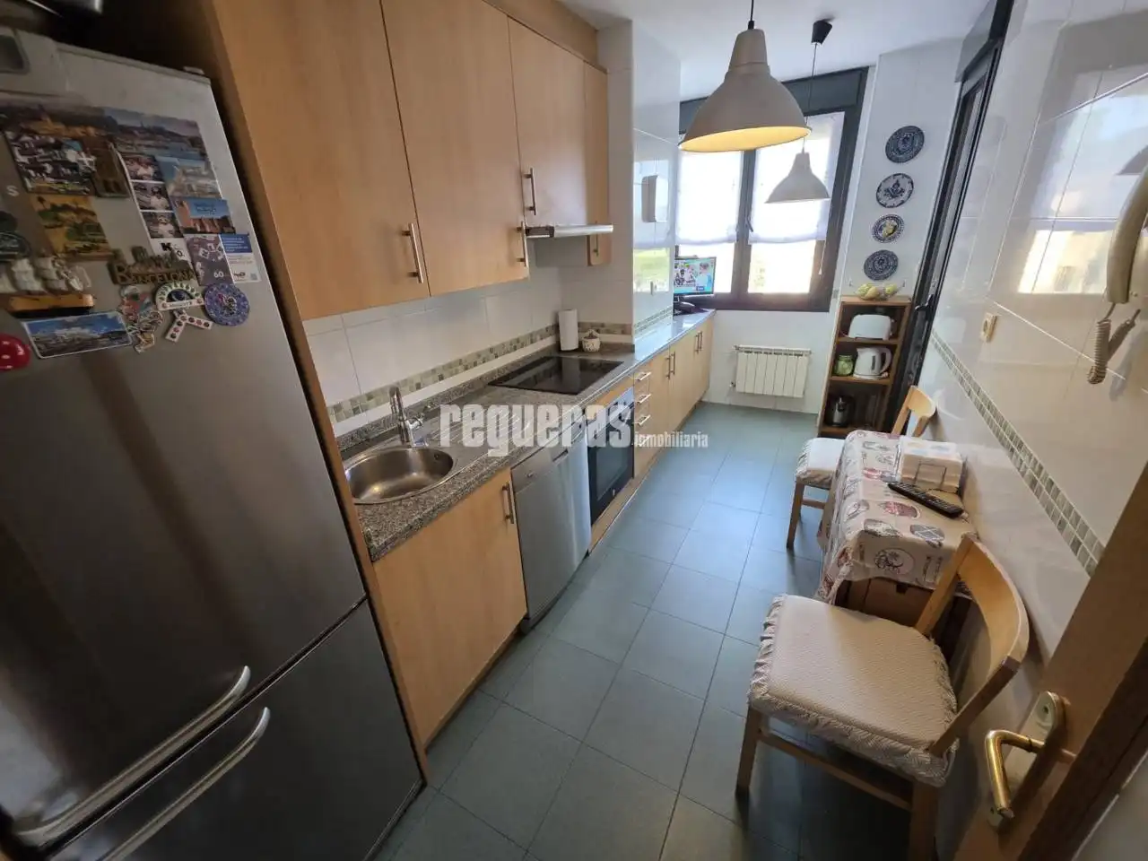 Cuina de Dúplex en venda en Avilés amb Calefacció, Parquet i Terrassa
