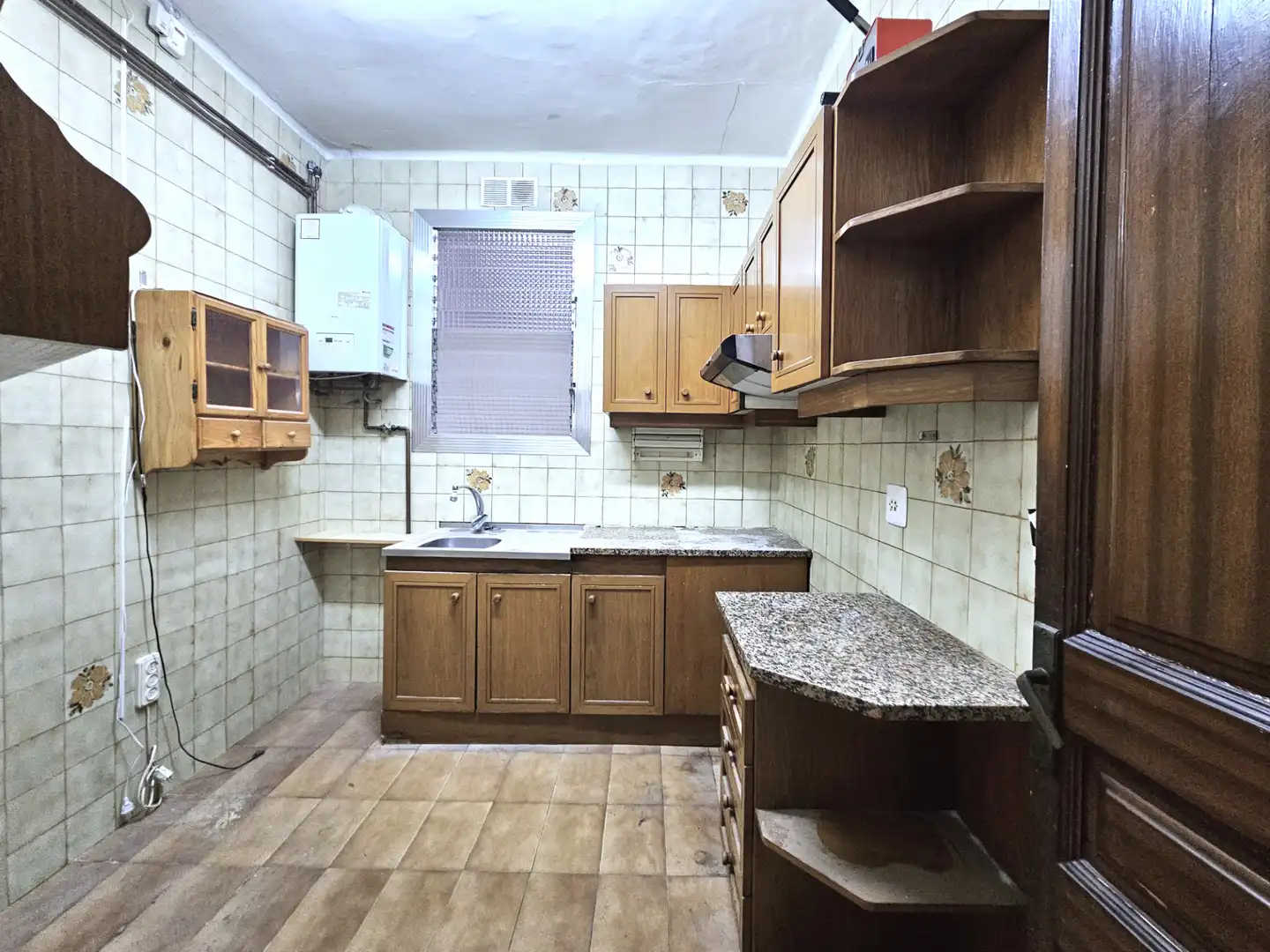 Cuina de Pis en venda en Barcelona amb Calefacció