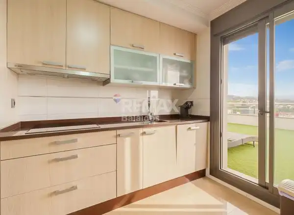 Kitchen of Attic for sale in Vigo   with Heating, Parquet flooring and Terrace