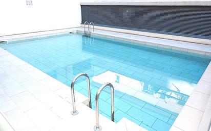 Swimming pool of Flat for sale in Badalona  with Air Conditioner, Heating and Parquet flooring