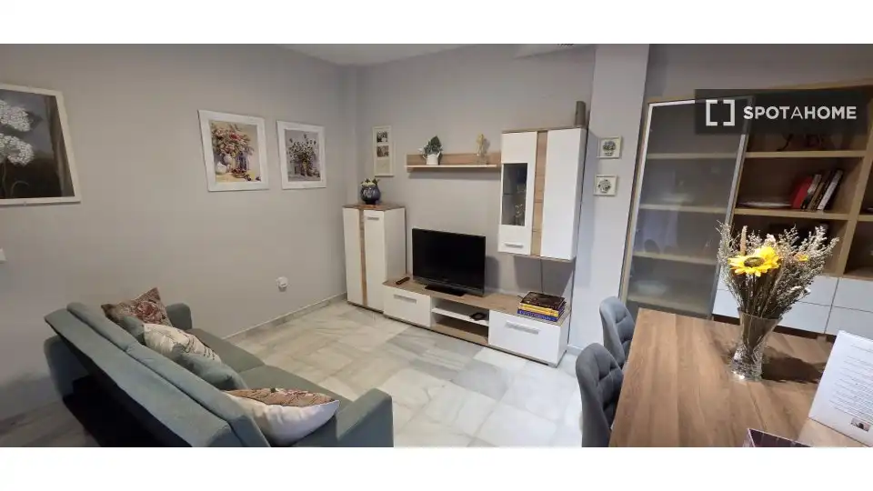 Sala d'estar de Apartament per a compartir en Sevilla amb Aire condicionat, Terrassa i Moblat