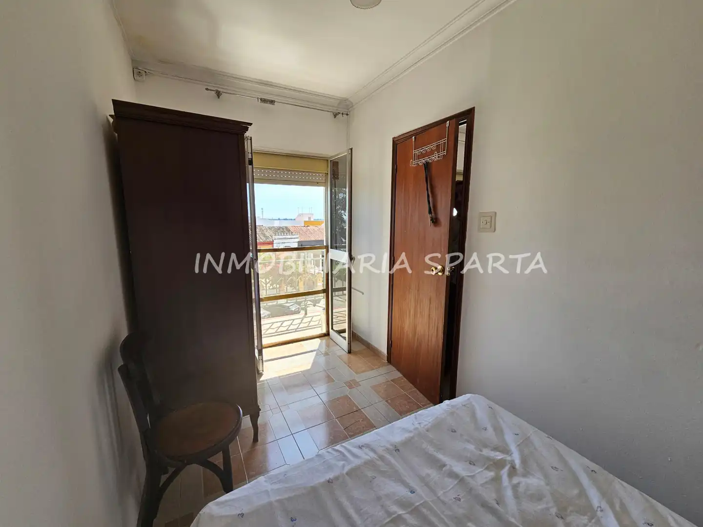 Habitación de Casa adosada en venta en Santiponce con Terraza, Trastero y Balcón