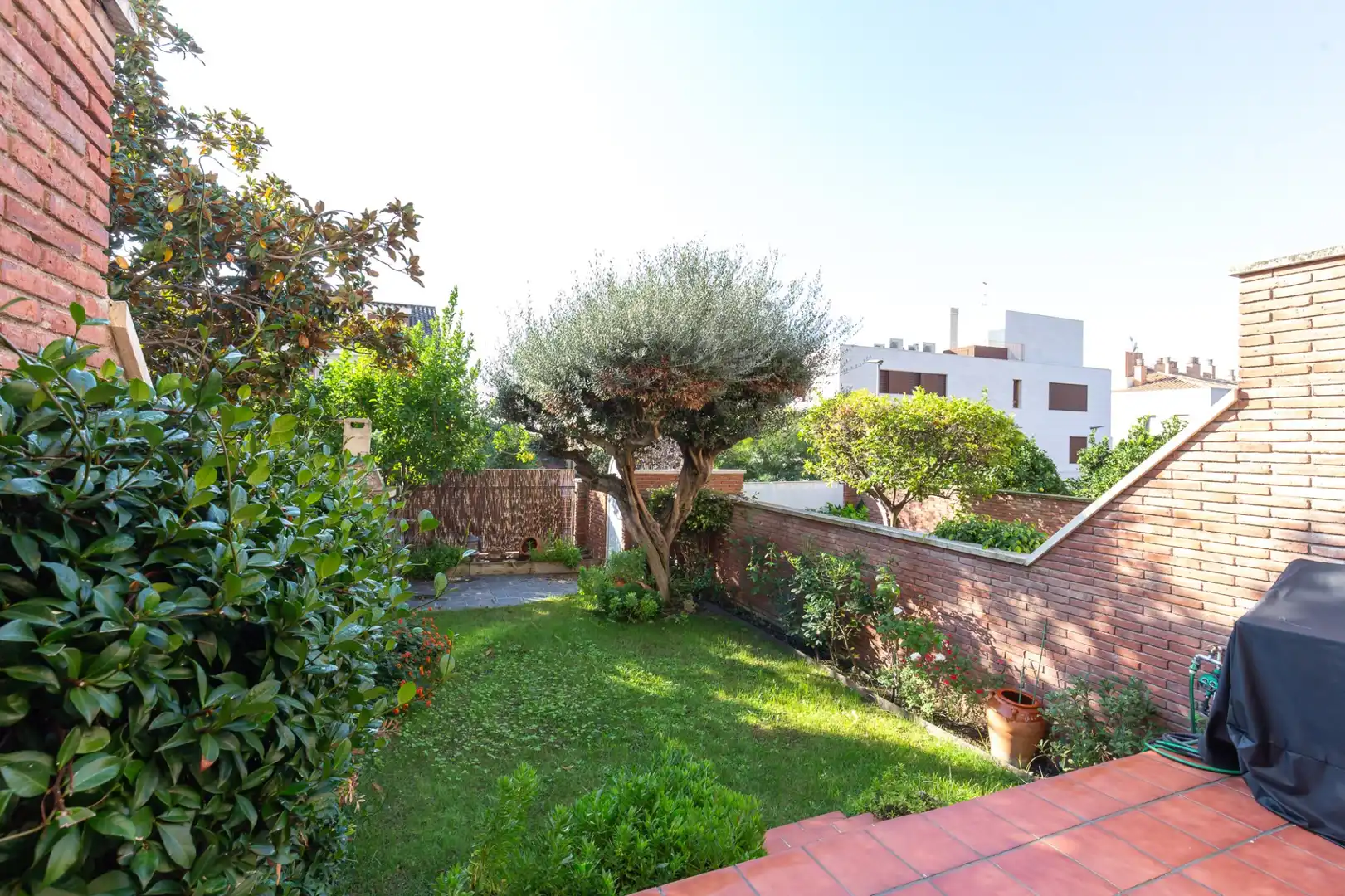 Jardí de Casa adosada en venda en Sant Feliu de Llobregat amb Calefacció, Terrassa i Traster