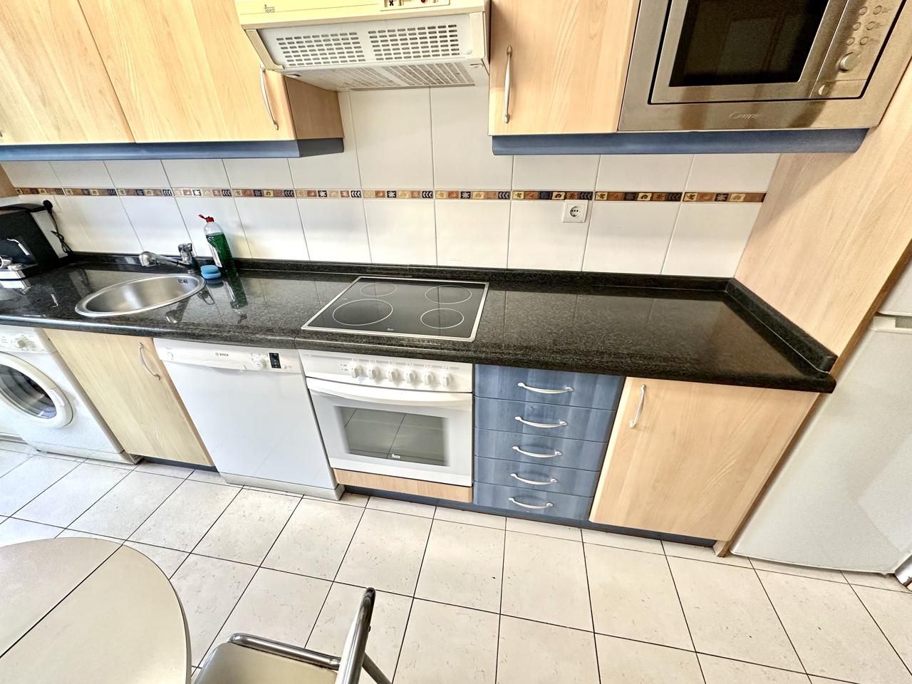 Kitchen of Flat for sale in Gijón   with Heating, Private garden and Storage room