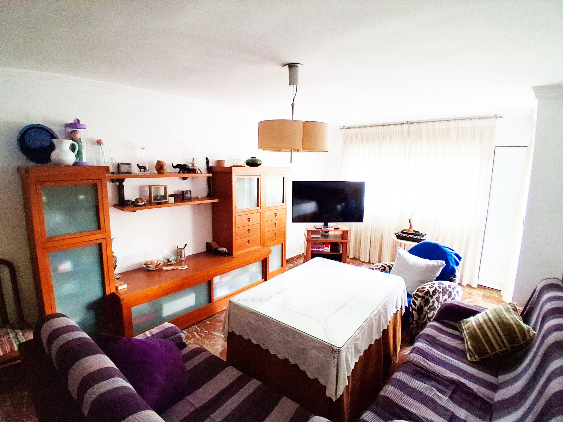 Sala de estar de Piso de alquiler en  Granada Capital con Aire acondicionado, Calefacción y Jardín privado