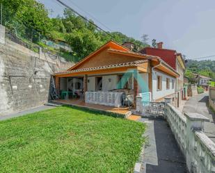 Exterior view of Single-family semi-detached for sale in San Martín del Rey Aurelio  with Private garden, Parquet flooring and Terrace