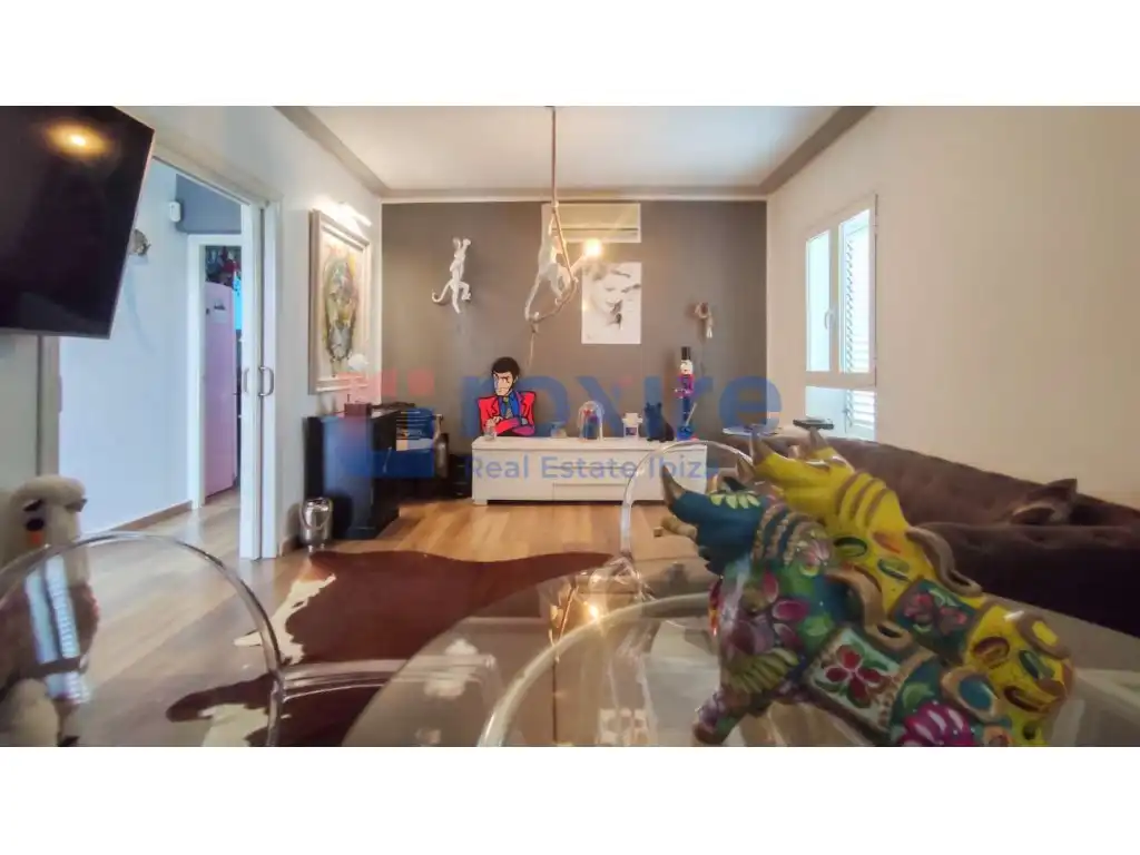 Sala d'estar de Planta baixa en venda en Sant Josep de sa Talaia amb Aire condicionat, Jardí privat i Terrassa
