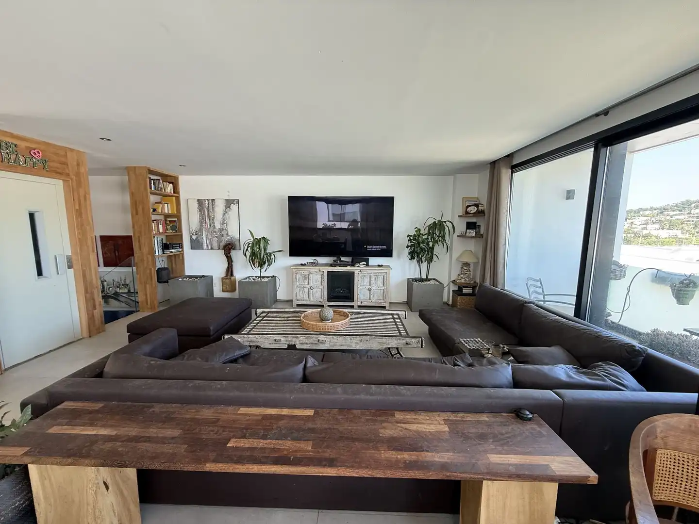 Sala d'estar de Casa adosada en venda en Santa Eulària des Riu amb Aire condicionat, Calefacció i Jardí privat