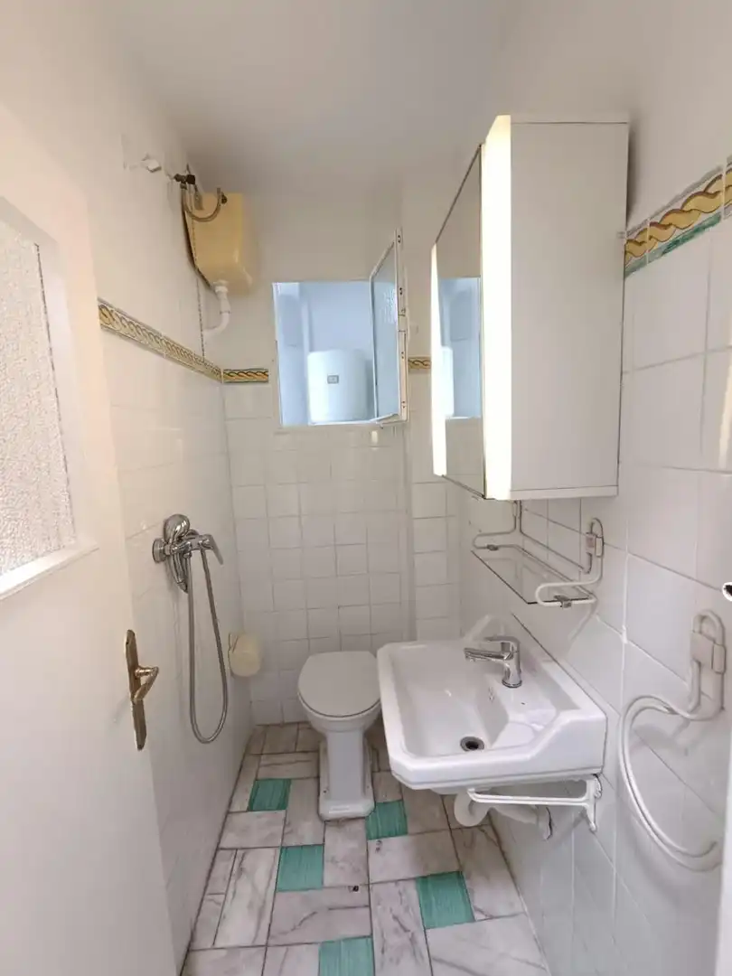Bathroom of Flat for share in Sevilla  with Washing machine