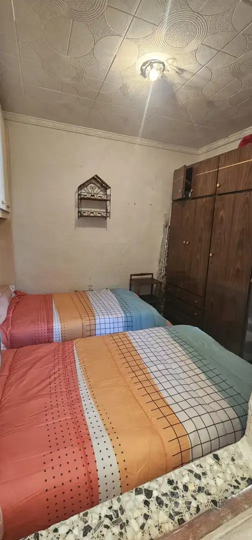 Habitación de Casa adosada en venta en Torrevieja con Jardín privado, Trastero y Amueblado